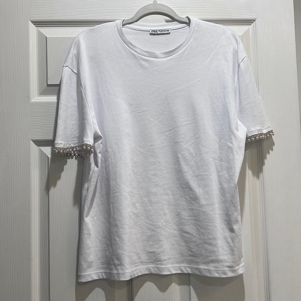 Zara White Top with Silver Accents. See the photos